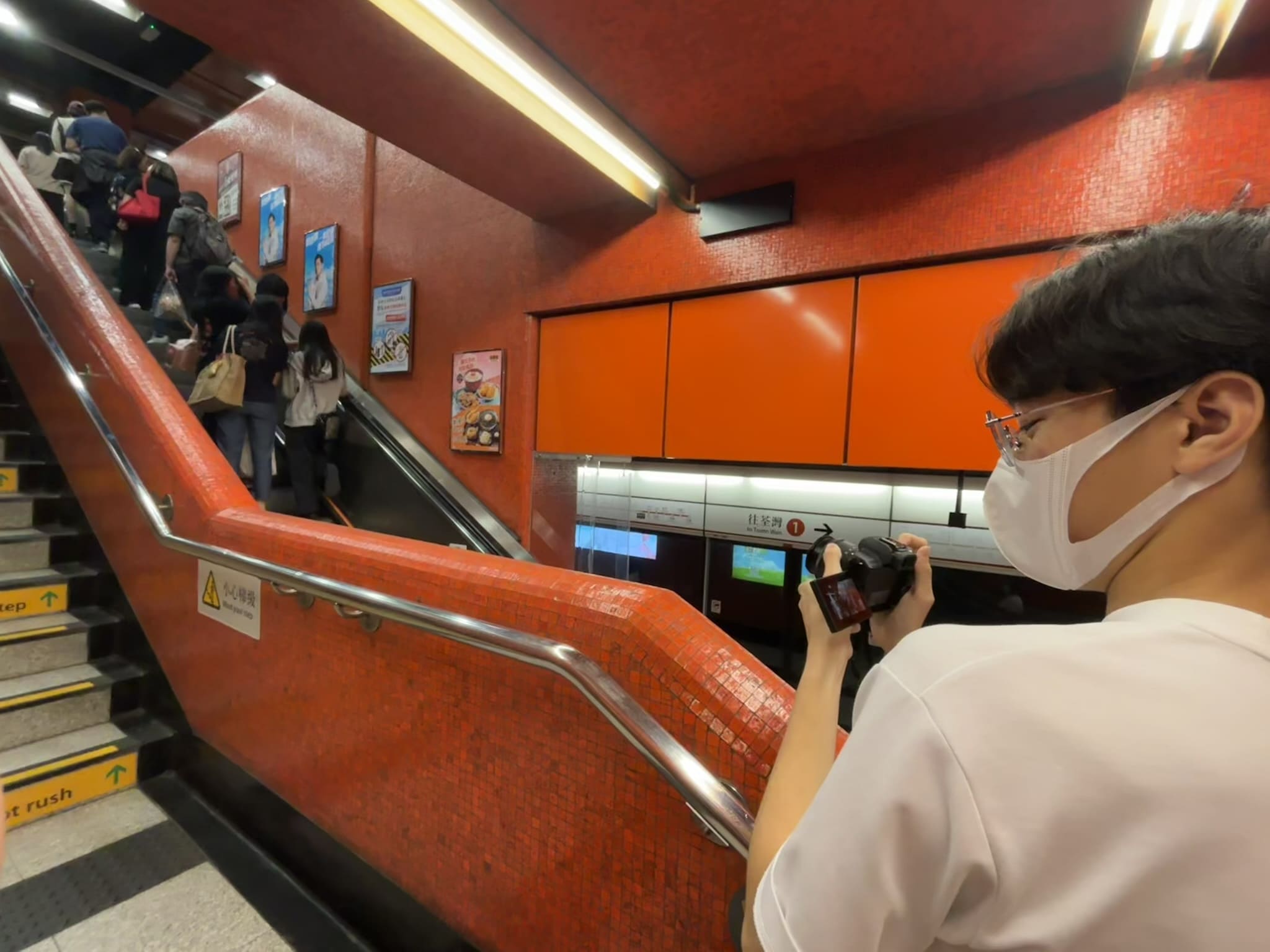 A background image of Wan Yat Hei